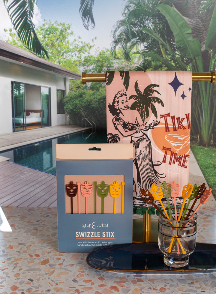 tiki time mid century modern vintage hawaii tea towel with chenille trim - tiki party barware. Shown with tiki head beverage mixing swizzle sticks