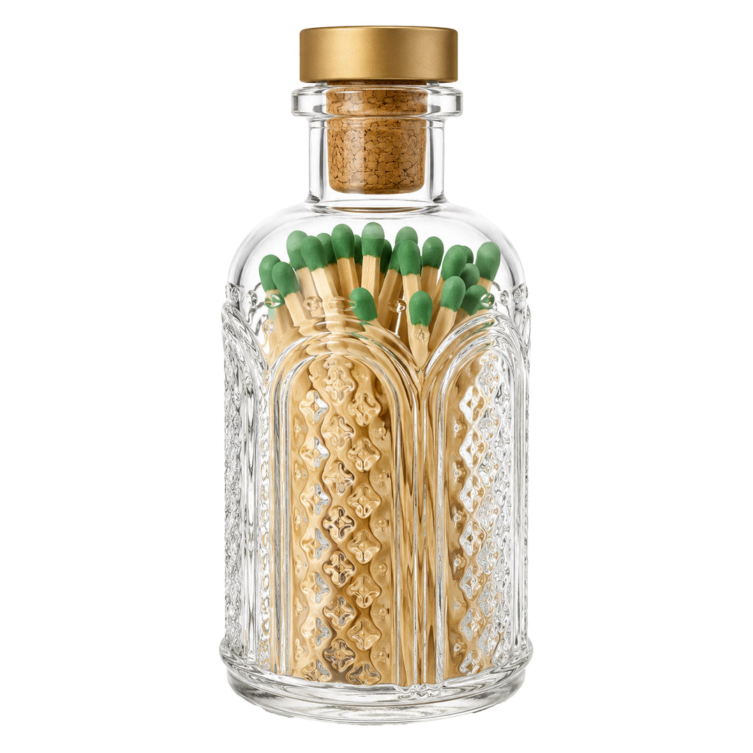 green match tip in vintage glass jar with gold lid cork top