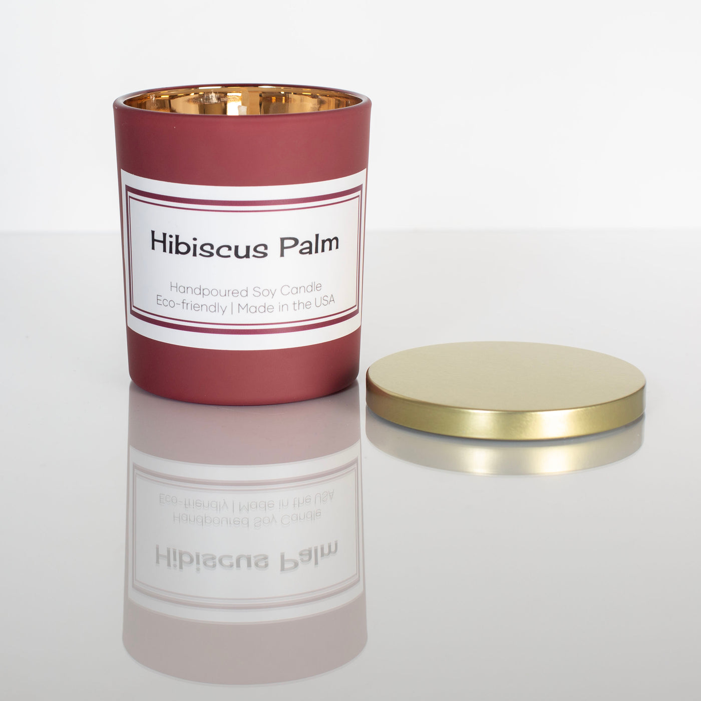 hibiscus palm summer red cranberry matte hand poured soy candle with gold inside and gold lid