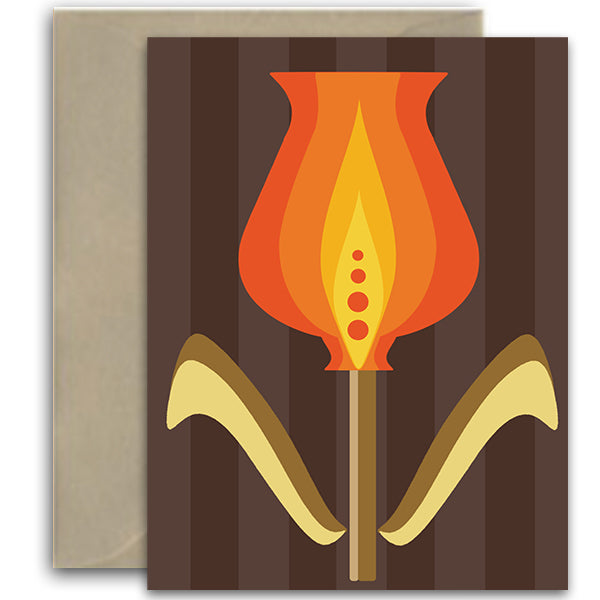 A greeting card or art print featuring a stylized orange and yellow tulip flower on a dark brown vertically striped background, shown with a plain kraft envelope behind it.