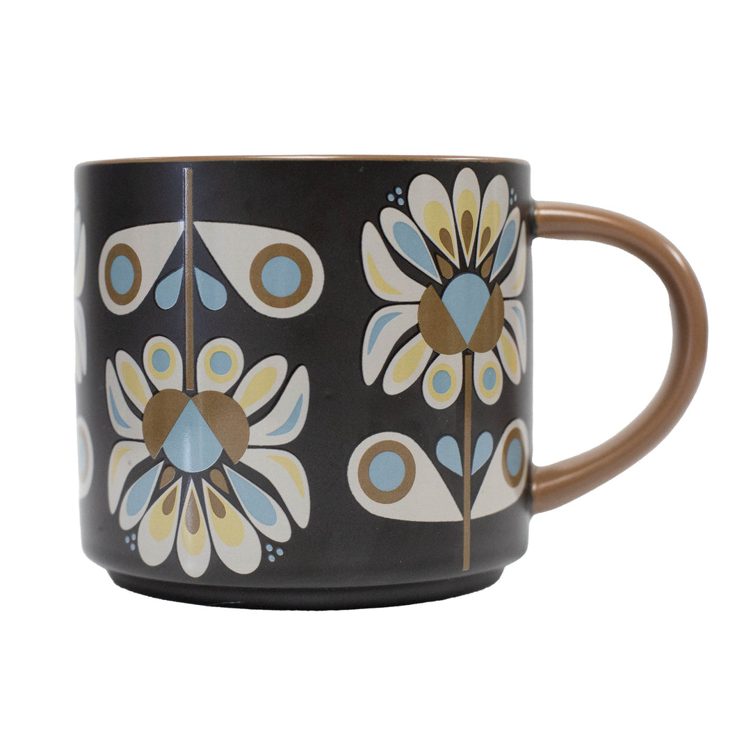 Black mug with a mid century modern floral pattern. Stackable matte mug