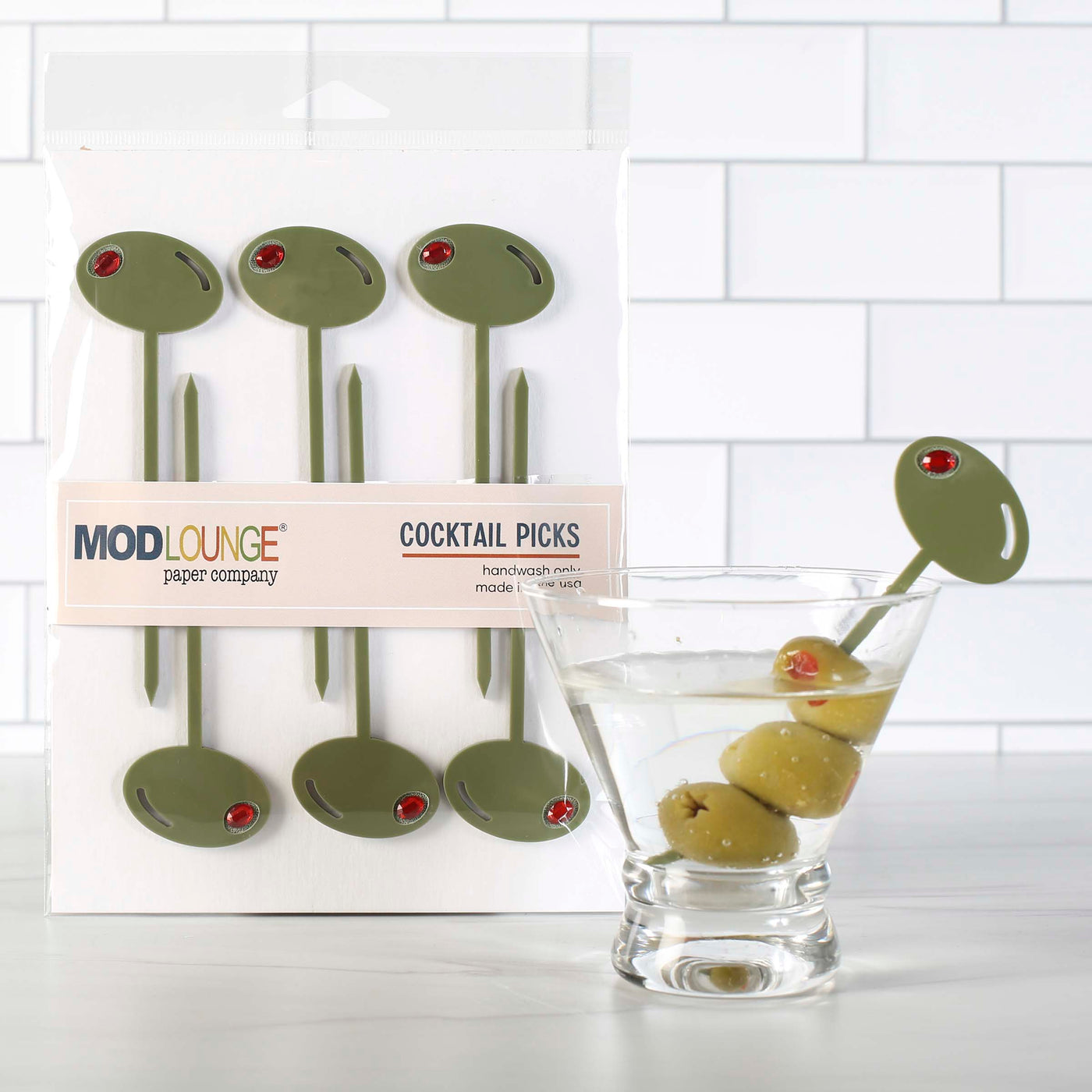 An elegant look with an affordable price. These Mid Century Modern inspired olive green acrylic cocktail pick set will make a classy statement on any bar. red Rhinestone "pit" accent adds a bit of glam. Makes a great gift for Housewarming, Newlyweds and Birthdays.