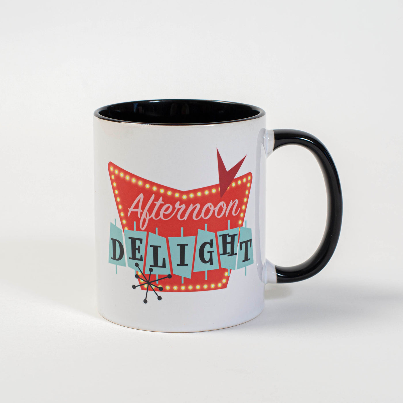 This 11oz coffee mug lets you enjoy your favorite beverage in vintage style. The contrasting interior and handle give it a nostalgic look, while the "Afternoon Delight" text pays homage to the retro look. Start your day with a cup of coffee and a reminder of simpler times.