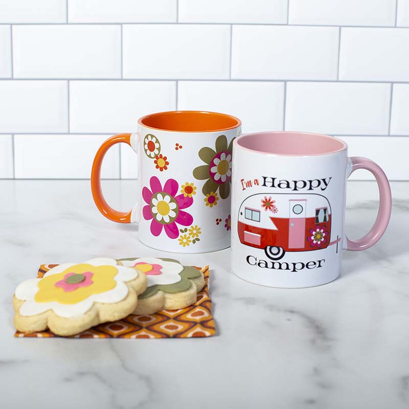 This 60's inspired Happy Camper with groovy flowers coffee mug gives you something special to wake up to besides the coffee! This vibrant mug features inside/handle color that will enhance the most creative of designs. Perfect for summer gifts, the Glamper Girl, or just to feel love on the bright side! Paired with Groovy Florals Coffee Mug