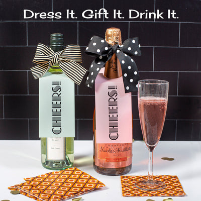 cheers pink paper wine tag with polka dot ribbon for birthdays, anniversary gift, housewarming gift, bachelorette gift or girls night out. Great for last minute add on gift or add to wine bottle