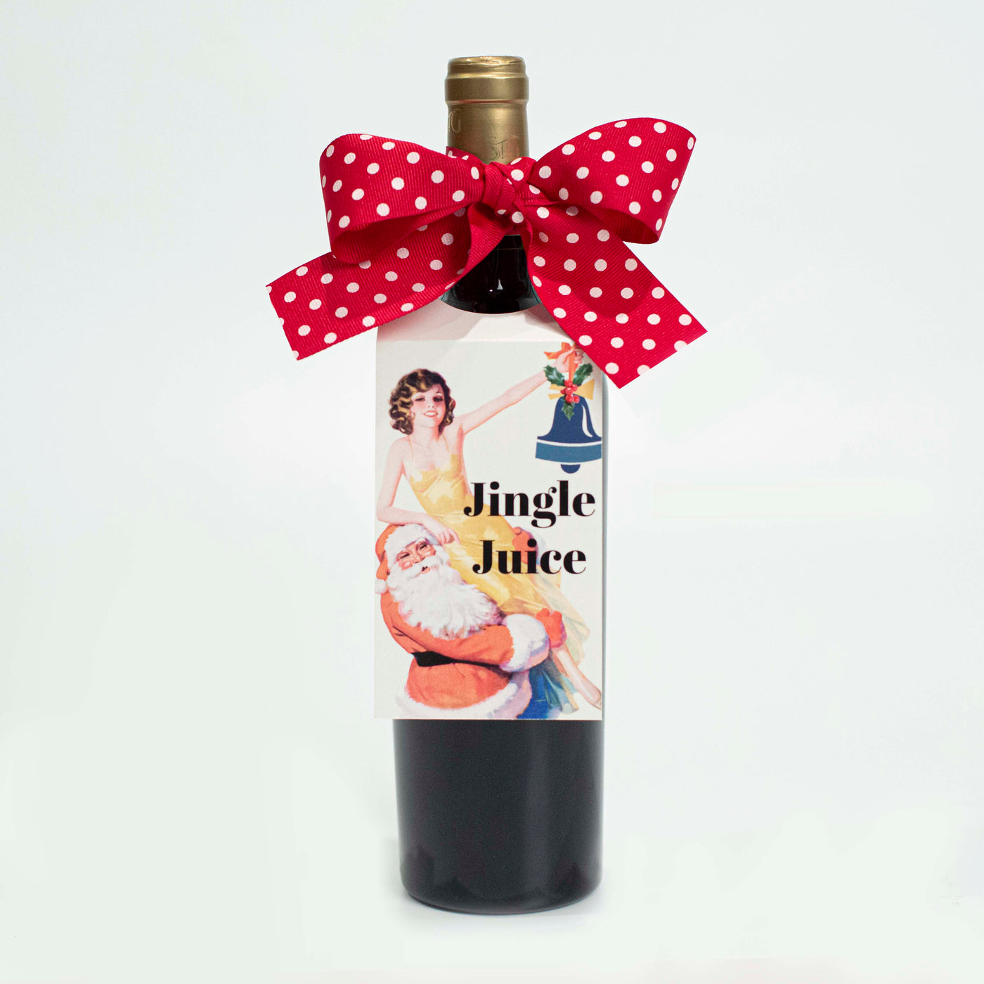 Holiday Paper wine tag with bow, Last minute dinner party? Enhance your holiday spirits with our Jingle Juice Wine Tag! This paper tag features a playful vintage illustration of Santa and cute pinup girl and includes a festive red polka dot bow. The humorous retro text reads "jingle juice", adding a touch of fun to any bottle. Keep some on hand in your car for a last minute stop at the liquor store! Dress It. Gift It. Drink It.